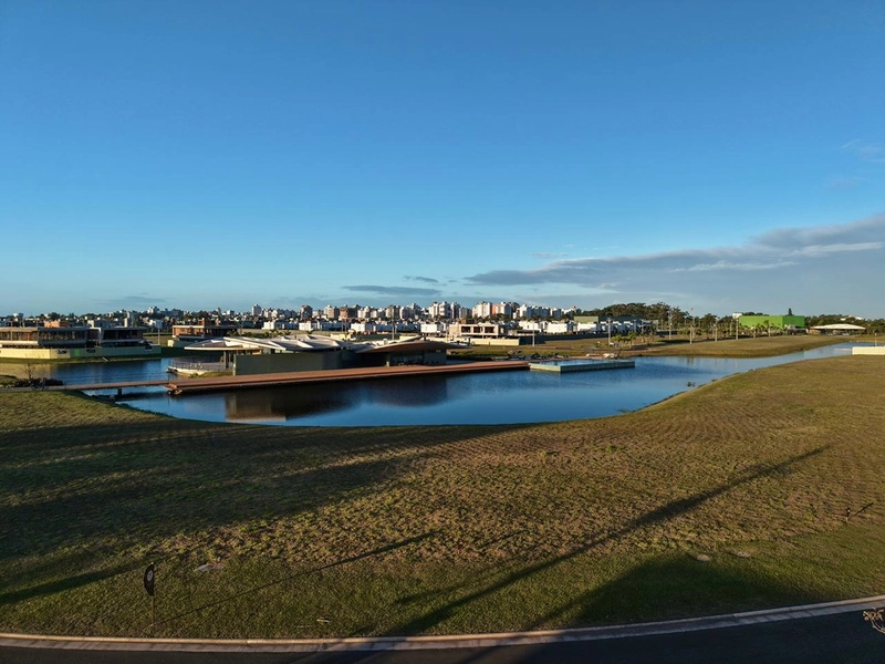Lote/Terreno à venda no condomínio Lótus em Atlântida: 1ª foto da galeria de imagens do imóvel