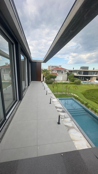 Casa Beira Lago à venda no condomínio Enseada Lagos - Xangri-Lá: 11ª foto da galeria de imagens do imóvel