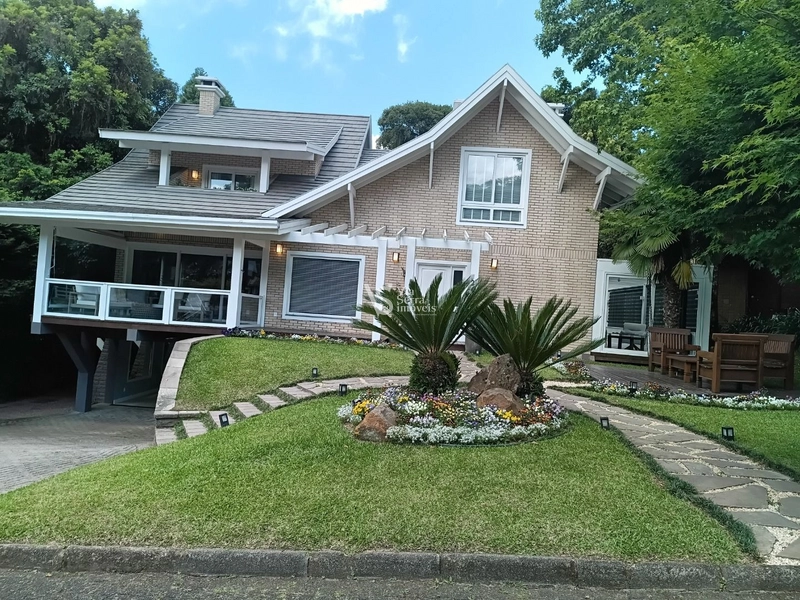 Charmosa casa em condomínio: 2ª foto da galeria de imagens do imóvel