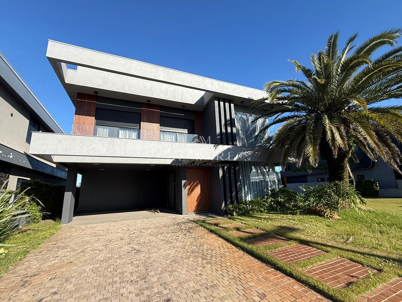 Casa beira lago com seis suítes mais lavabo ao lado da infra: 4ª foto da galeria de imagens do imóvel