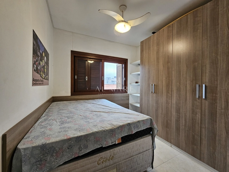 Casa bairro com três dormitórios sendo um suíte, piscina e vaga de garagem coberta poucos metros da praia : 2ª foto da galeria de imagens do imóvel