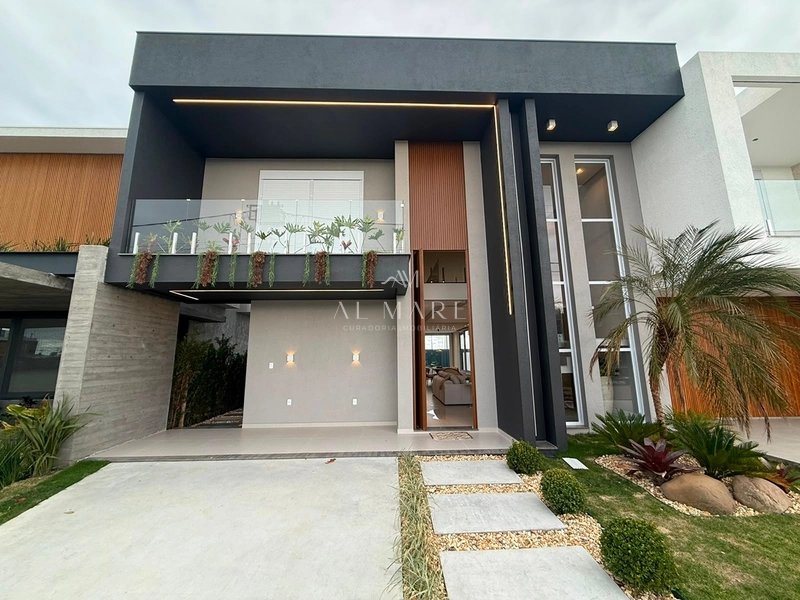 Casa em condomínio mobiliada e decorada com quatro suítes sendo uma térrea : 3ª foto da galeria de imagens do imóvel