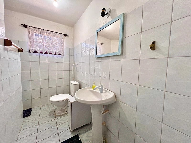 casa bairro com cinco dormitórios sendo uma suíte uma quadra do mar : 13ª foto da galeria de imagens do imóvel