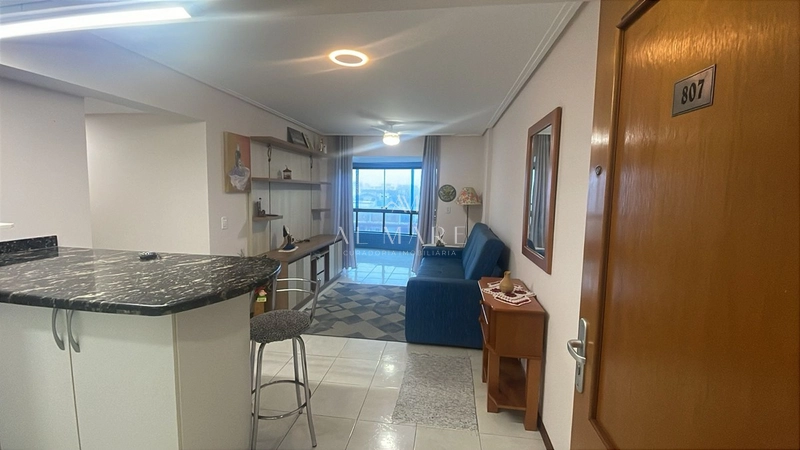 apartamento a uma quadra do mar com dois dormitórios sendo uma suíte e vaga de garagem: 2ª foto da galeria de imagens do imóvel