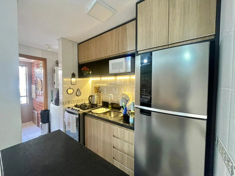 Apartamento de dois dormitórios com sacada de frente vaga de garagem e infra no prédio: 3ª foto da galeria de imagens do imóvel