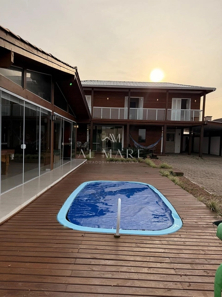 Casa Bairro com cinco dormitórios, mobiliada e com três vagas de garagem: 16ª foto da galeria de imagens do imóvel