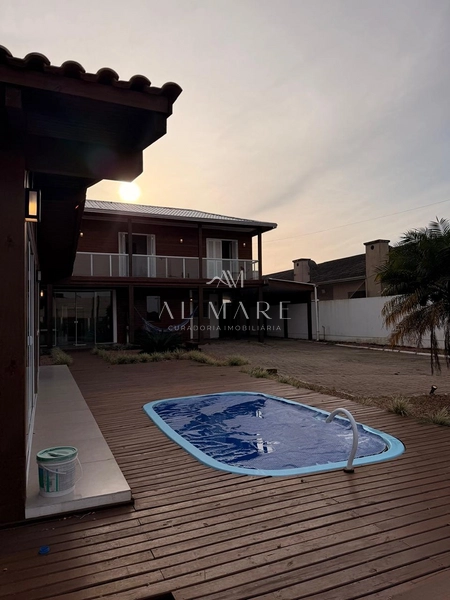 Casa Bairro com cinco dormitórios, mobiliada e com três vagas de garagem: 11ª foto da galeria de imagens do imóvel