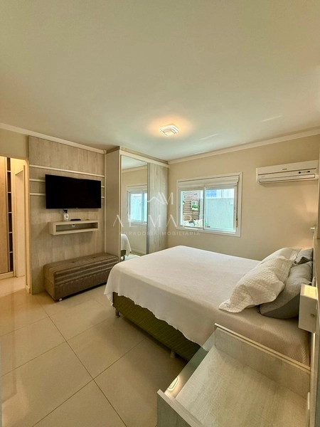 Apartamento gigantesco com três dormitórios e duas vagas de garagem e terraço coberto: 19ª foto da galeria de imagens do imóvel