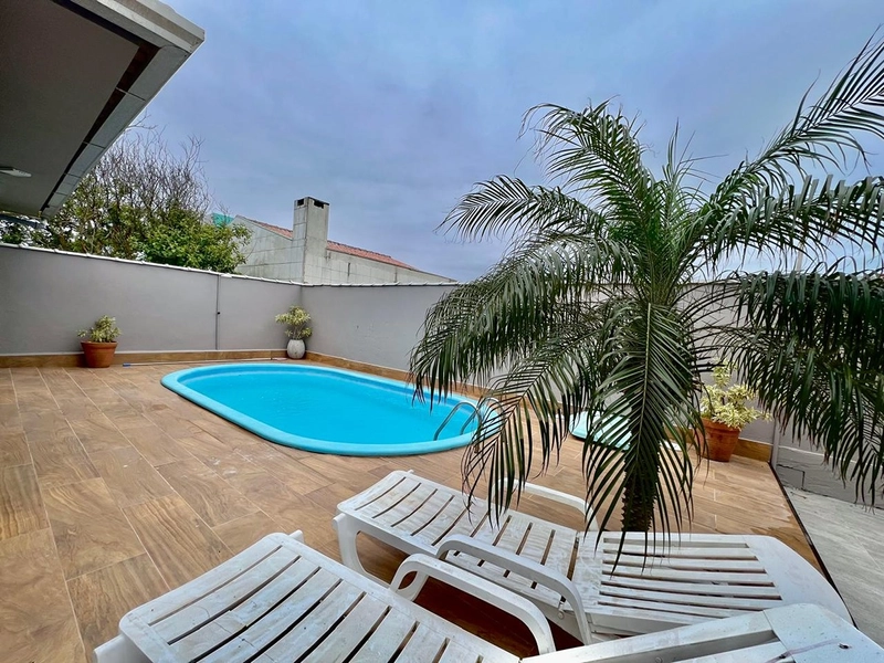 Casa térrea com 3 dormitórios sendo 2 suítes, piscina grande com espaço gourmet com forno de pizza, fogão de rabo e churrasqueira. : 9ª foto da galeria de imagens do imóvel