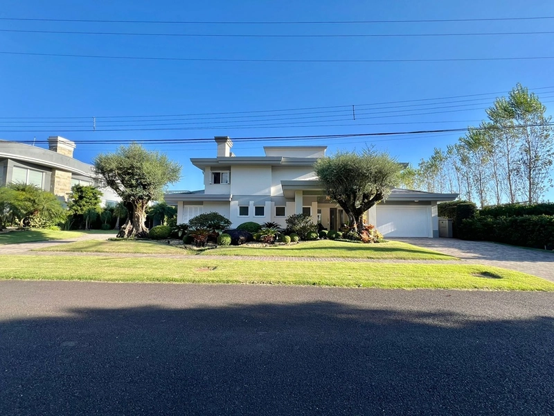 Mansão de 2 terrenos Beira Lago no Condomínio Atlântida Ilhas Park com 6 suítes. : 1ª foto da galeria de imagens do imóvel