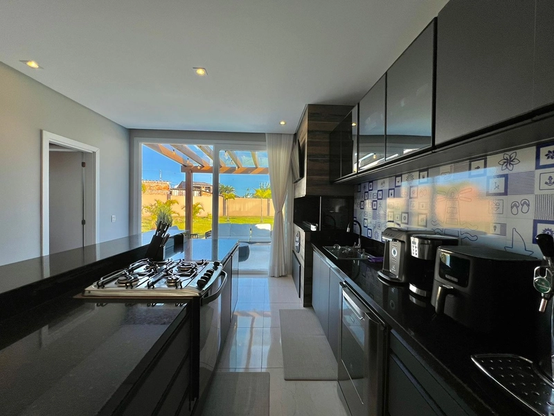 Uma casa funcional, de fundos para área verde com bastante espaço e ventilação! : 14ª foto da galeria de imagens do imóvel