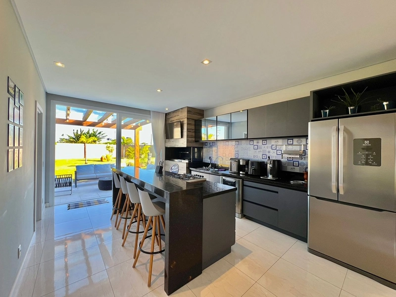 Uma casa funcional, de fundos para área verde com bastante espaço e ventilação! : 13ª foto da galeria de imagens do imóvel