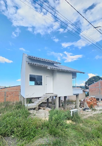 Casa 2 dormitórios bairro Tributo: 2ª foto da galeria de imagens do imóvel