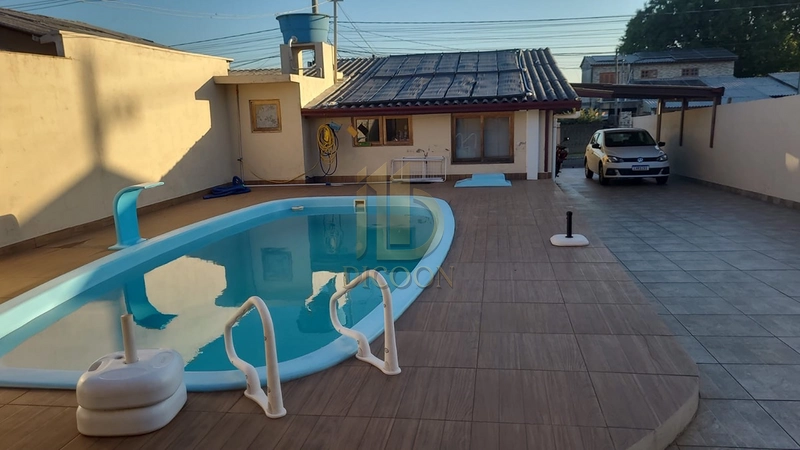 Casa com 4 quartos à venda : 10ª foto da galeria de imagens do imóvel