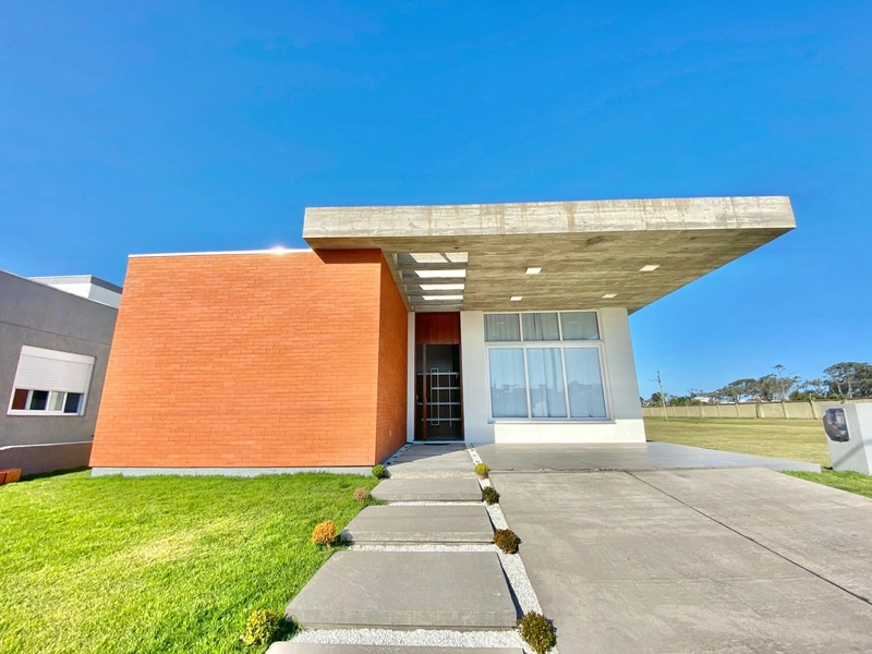 CASA EM CONDOMÍNIO FECHADO EM CAPÃO DA CANOA -RS: 1ª foto da galeria de imagens do imóvel