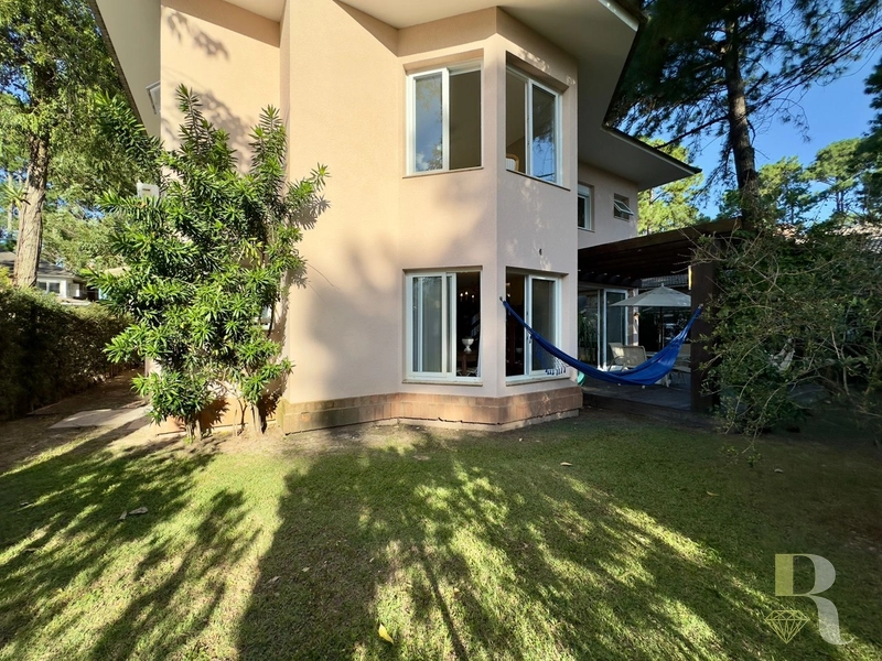 SOBRADO CONDOMINIO CARMEL EM ATLANTIDA: 3ª foto da galeria de imagens do imóvel