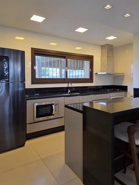 SOBRADO NO CENTRO DE XANGRI-LÁ – 3 DORMITÓRIOS | ALTO PADRÃO: 34ª foto da galeria de imagens do imóvel