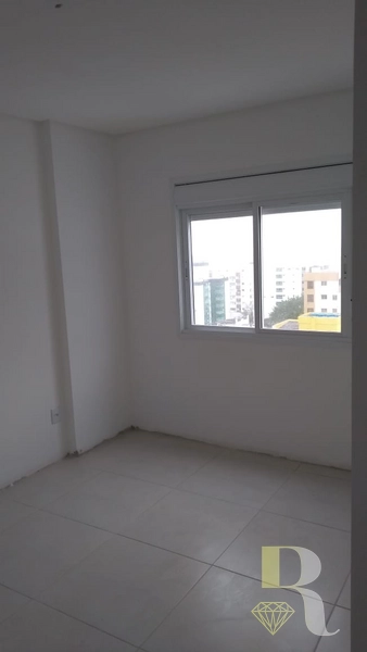 APARTAMENTO DOIS DORMITÓRIOS AV. CENTRAL: 3ª foto da galeria de imagens do imóvel