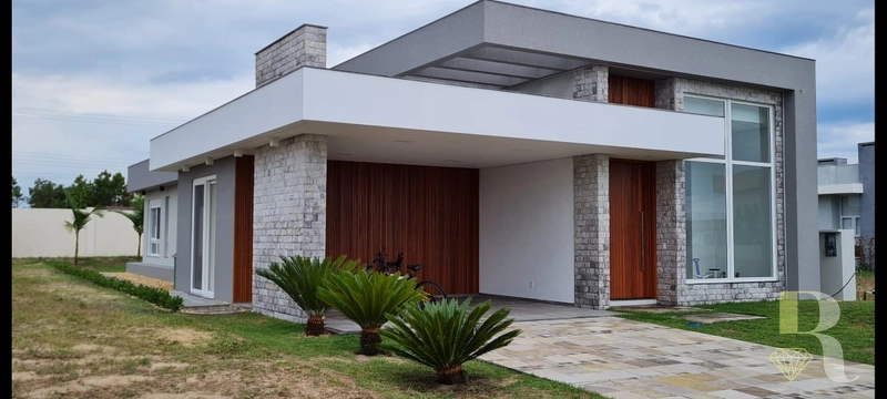 CASA EM CONDOMÍNIO FECHADO CAPÃO NOVO- RS: 1ª foto da galeria de imagens do imóvel