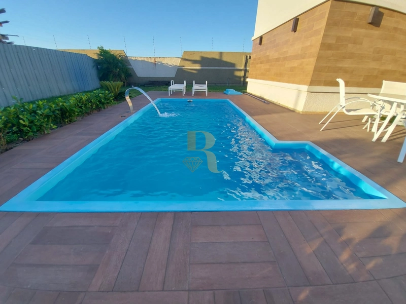 Casa condomínio com psicina: 2ª foto da galeria de imagens do imóvel