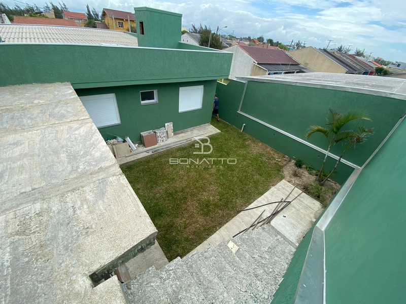 Casa em Atlântida Sul: 3ª foto da galeria de imagens do imóvel