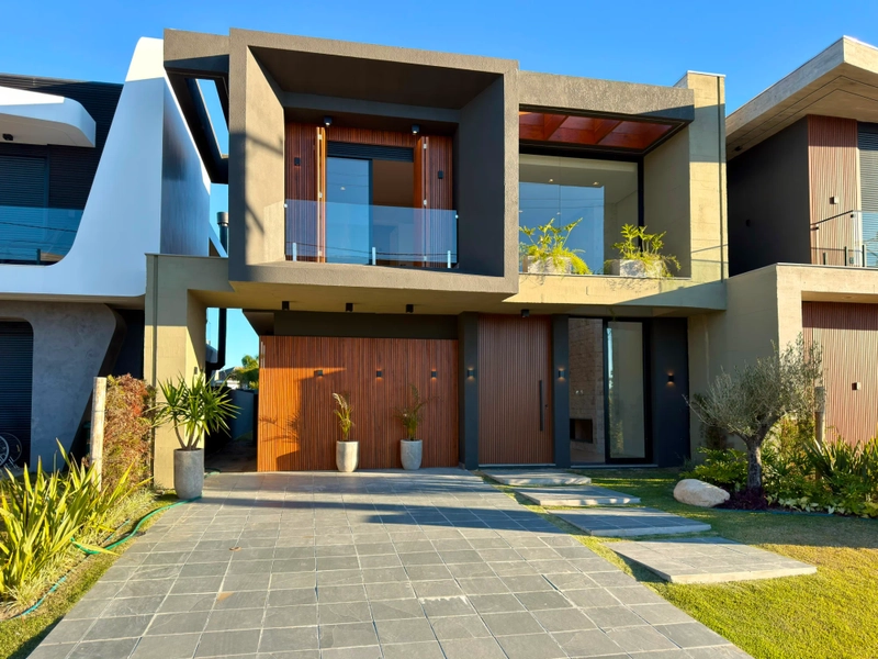 Casa 4 suítes com piscina - Condomínio Sunset, Xangri-lá: 2ª foto da galeria de imagens do imóvel