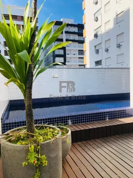 APARTAMENTO A VENDA FRENTE A PRAÇA E  A POUCOS PASSOS DO MAR.: 2ª foto da galeria de imagens do imóvel