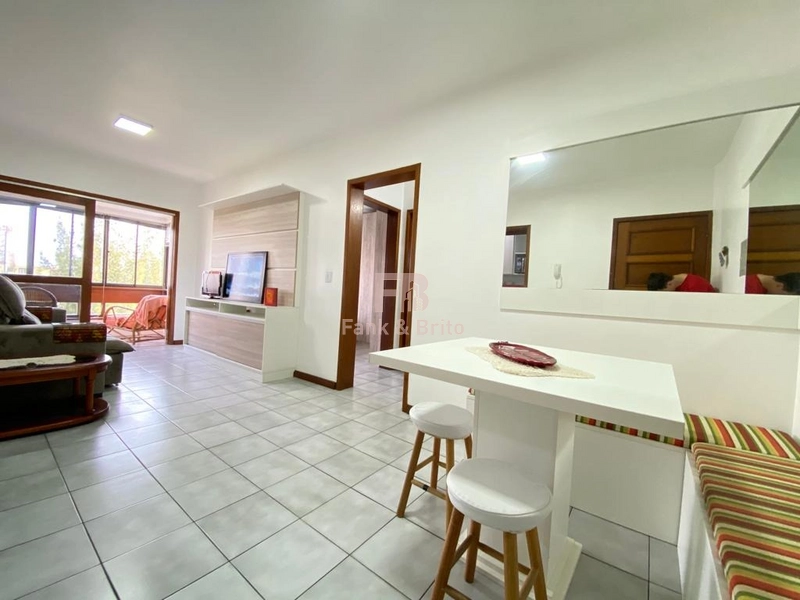 APARTAMENTO AOS PÉS DA PRAÇA FLAVIO EM CAPÃO DA CANOA: 1ª foto da galeria de imagens do imóvel