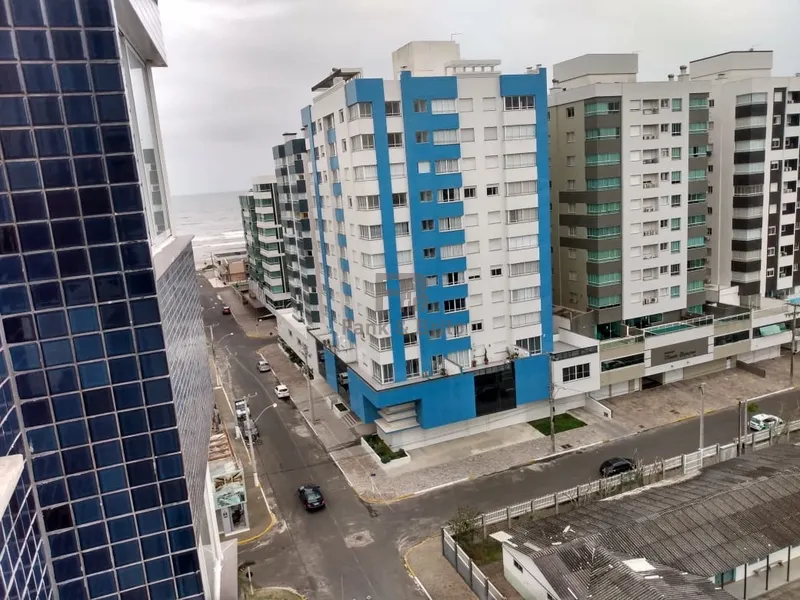 APARTAMENTO A VENDA DE FRENTE PARA A PRAÇA EM CAPÃO DA CANOA: 4ª foto da galeria de imagens do imóvel