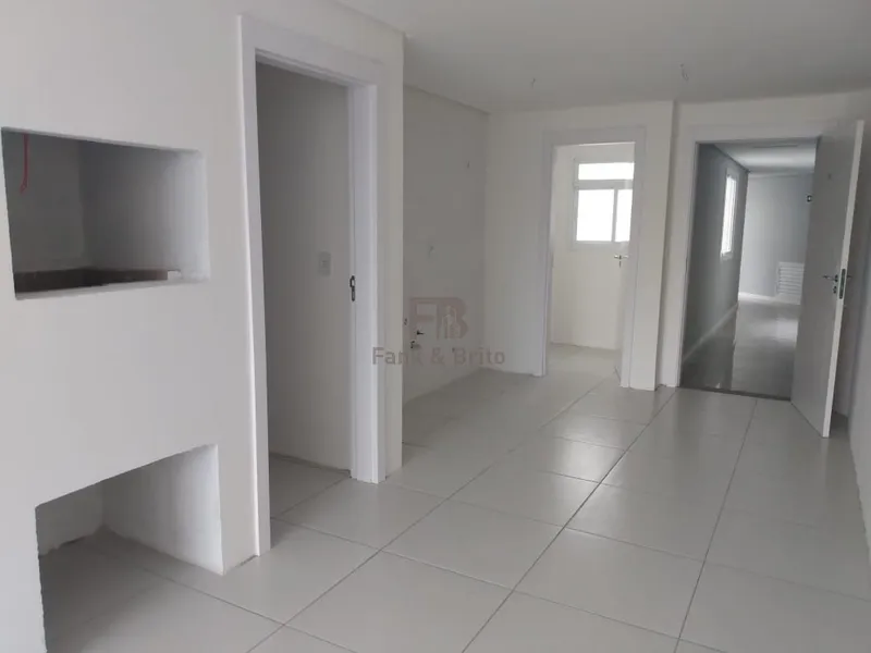 APARTAMENTO A VENDA DE FRENTE PARA A PRAÇA EM CAPÃO DA CANOA: 7ª foto da galeria de imagens do imóvel