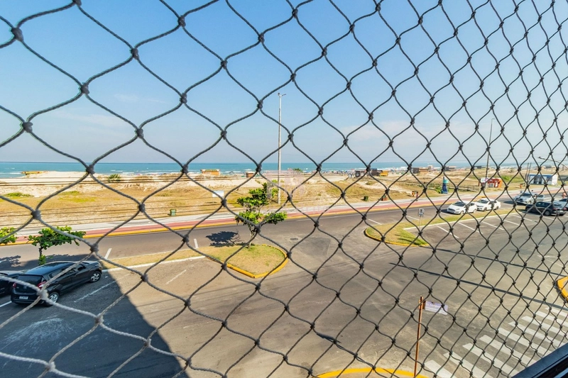 APARTAMENTO A VENDA NA BEIRA MAR DE CAPÃO DA CANOA: 2ª foto da galeria de imagens do imóvel