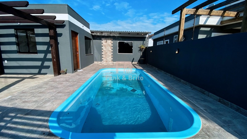 Casa com piscina em Capão da Canoa: 6ª foto da galeria de imagens do imóvel