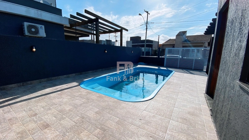 Casa com piscina em Capão da Canoa: 7ª foto da galeria de imagens do imóvel