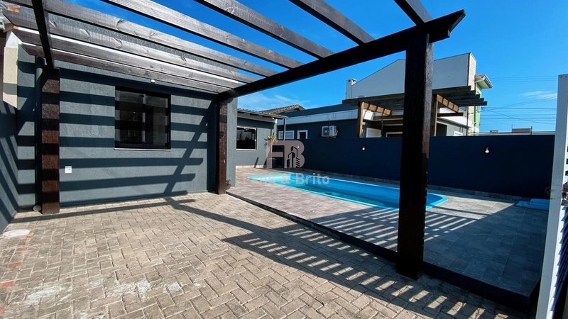 Casa com piscina em Capão da Canoa: 5ª foto da galeria de imagens do imóvel