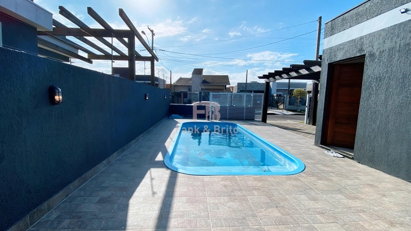 Casa com piscina em Capão da Canoa: 8ª foto da galeria de imagens do imóvel