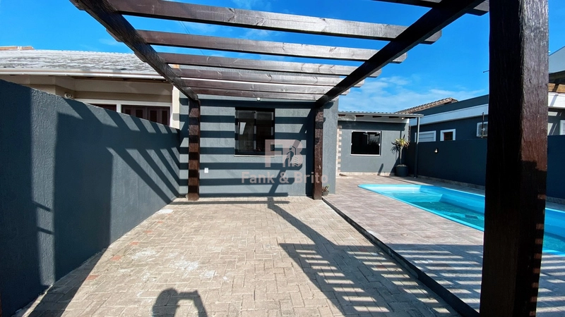 Casa com piscina em Capão da Canoa: 4ª foto da galeria de imagens do imóvel