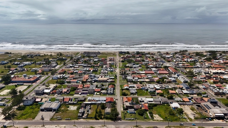 CASA A VENDA EM CAPÃO DA CANOA A DUAS QUADRAS DO MAR: 21ª foto da galeria de imagens do imóvel