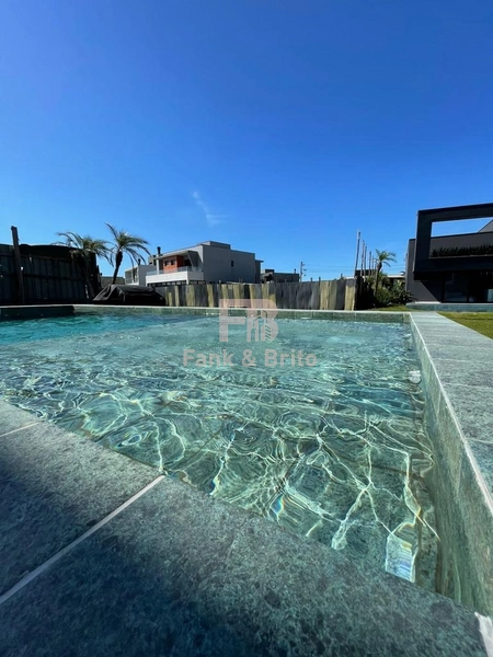 SOBRADO A VENDA EM CONDOMINIO FECHADO EM XANGRI-LÁ: 6ª foto da galeria de imagens do imóvel