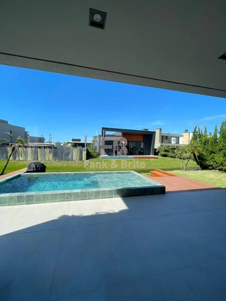 SOBRADO A VENDA EM CONDOMINIO FECHADO EM XANGRI-LÁ: 7ª foto da galeria de imagens do imóvel