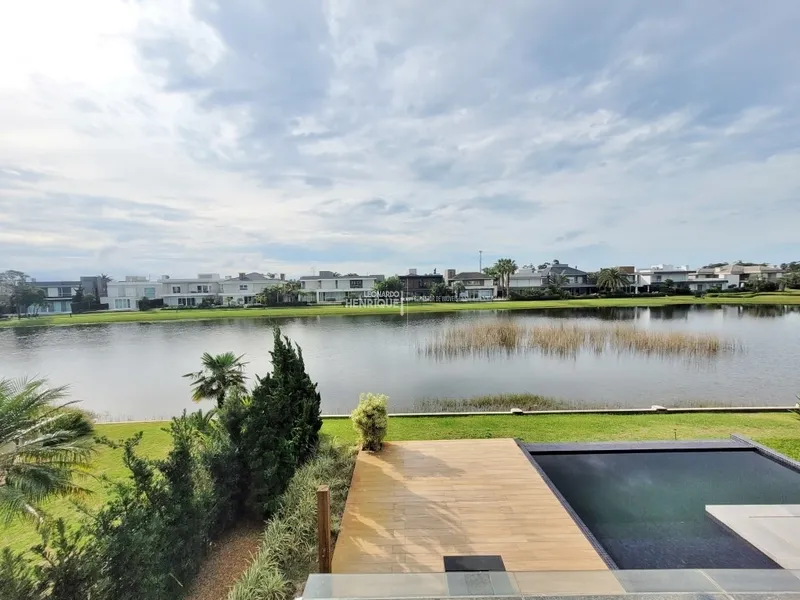 Condomínio Bosques de Atlântida: 40ª foto da galeria de imagens do imóvel