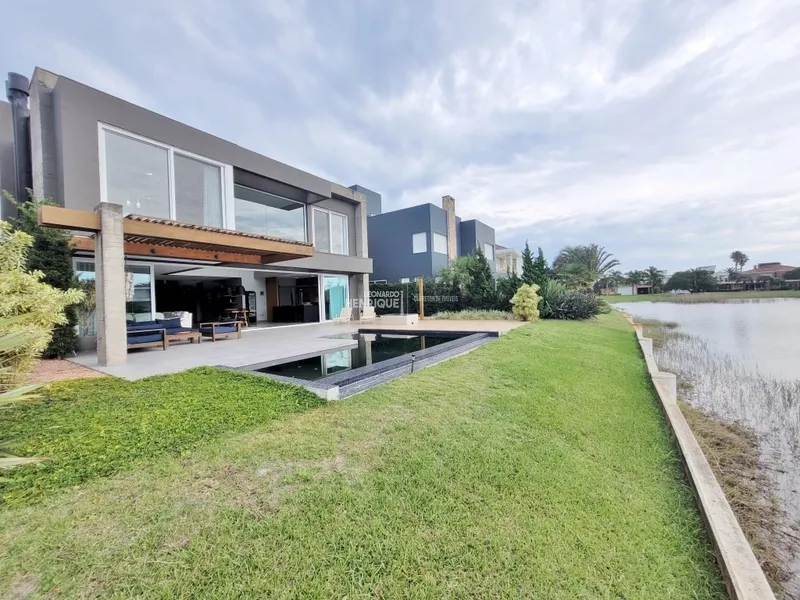 Condomínio Bosques de Atlântida: 3ª foto da galeria de imagens do imóvel