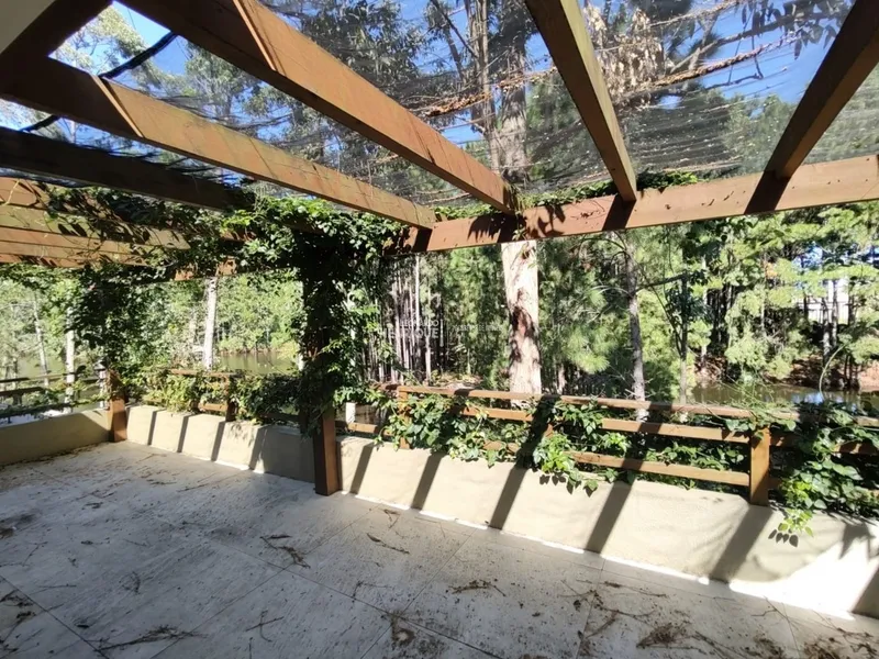 Sobrado beira lago em condomínio fechado de Atlântida: 19ª foto da galeria de imagens do imóvel