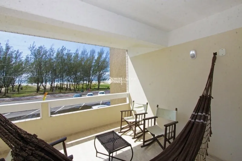 APARTAMENTO DE QUATRO DORMITÓRIOS DE FRENTE PARA A PRAIA: 2ª foto da galeria de imagens do imóvel