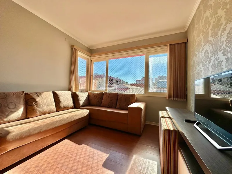 APARTAMENTO COM SACADA DE FRENTE JUNTO AO MAR E PRAÇA: 7ª foto da galeria de imagens do imóvel