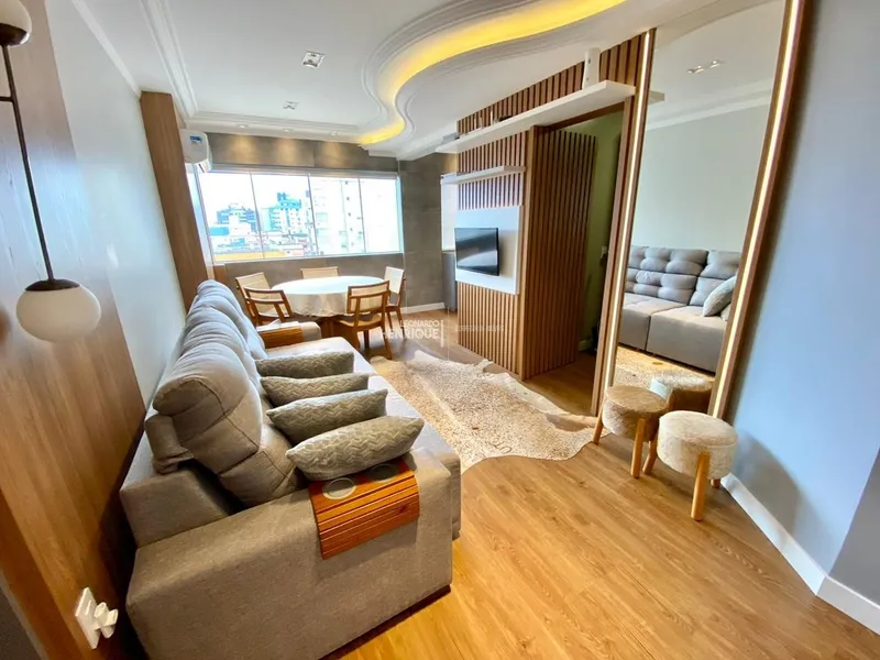 Apartamento de 2 dormitórios no centro de Capão da canoa: 1ª foto da galeria de imagens do imóvel