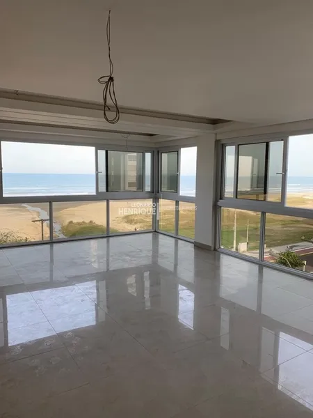 BELLISIMO APARTAMENTO NA BEIRA MAR DE CAPÃO DA CANOA: 1ª foto da galeria de imagens do imóvel