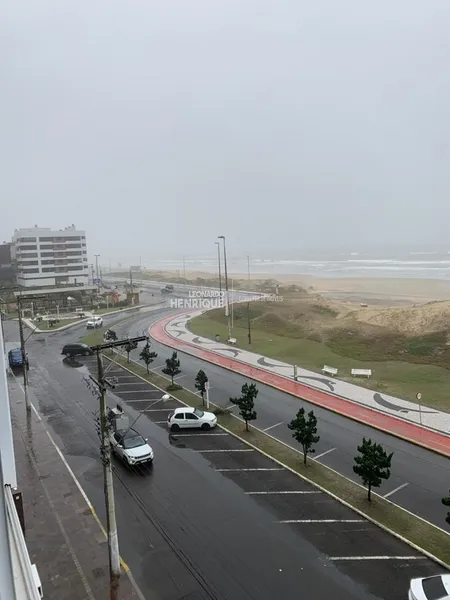 BELLISIMO APARTAMENTO NA BEIRA MAR DE CAPÃO DA CANOA: 2ª foto da galeria de imagens do imóvel