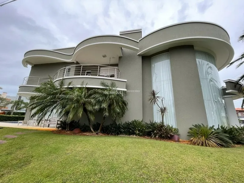 Mansão de esquina no Condomínio Enseada: 2ª foto da galeria de imagens do imóvel