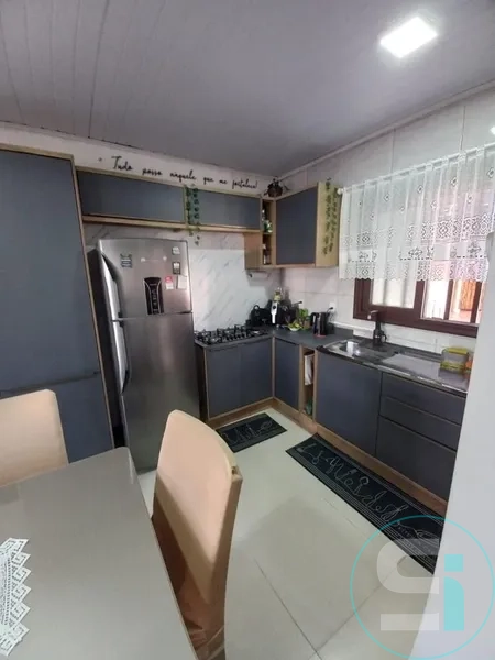 Casa 2 dormitórios de terreno inteiro em CAPÃO DA CANOA: 14ª foto da galeria de imagens do imóvel