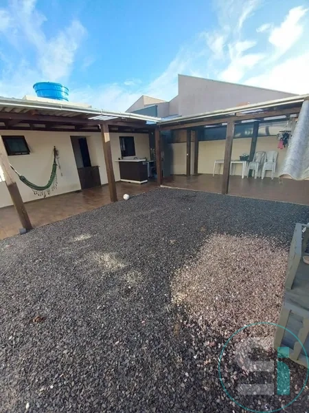 Casa 2 dormitórios de terreno inteiro em CAPÃO DA CANOA: 2ª foto da galeria de imagens do imóvel